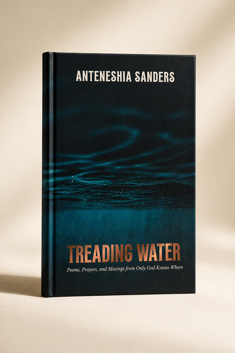 A hardcover book titled 'Treading Water' by Anteneshia Sanders, standing upright on a warm beige surface with soft shadowing. The cover features a dark blue and black water design with white and copper-toned text.